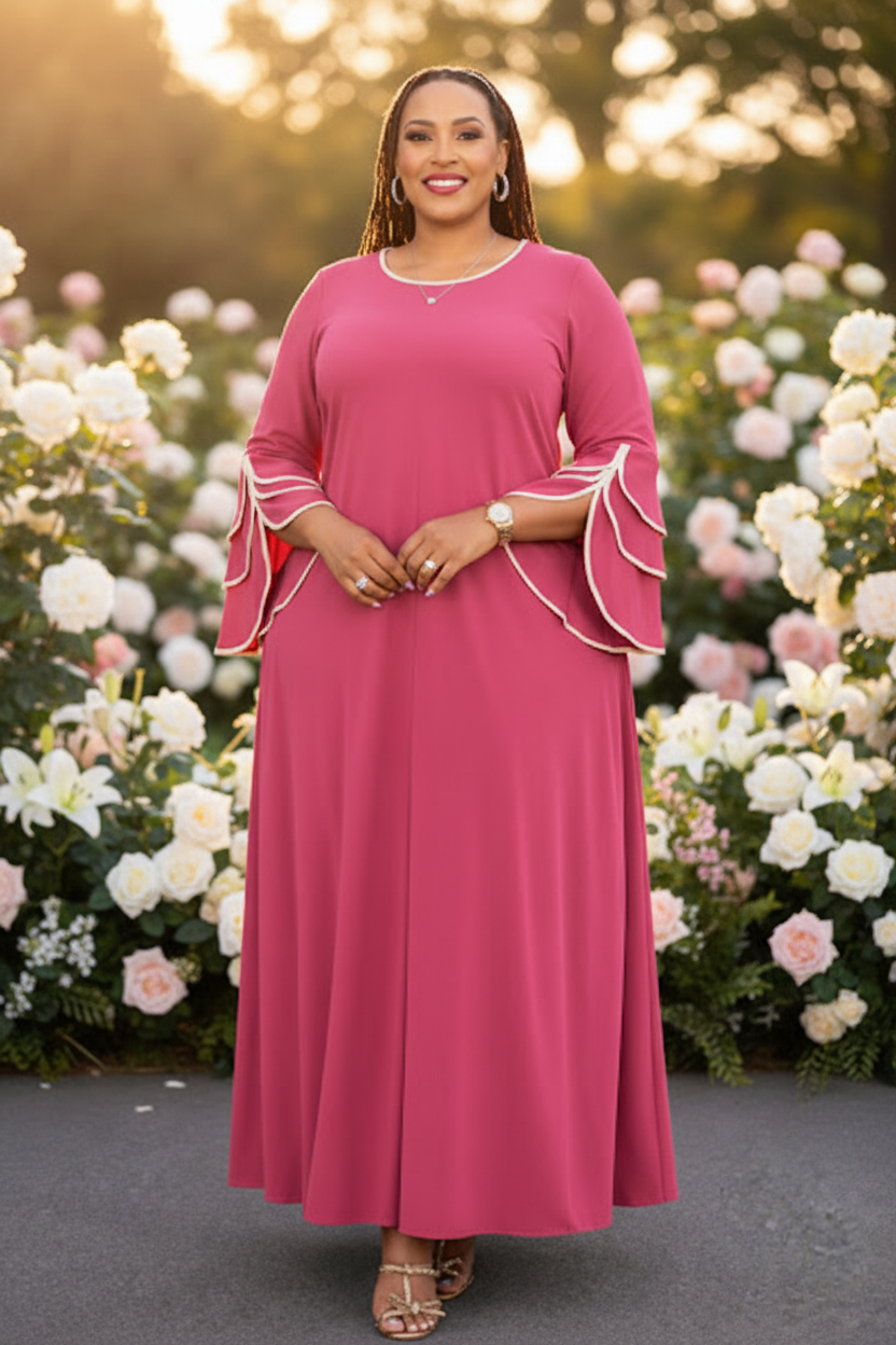 Rose pink flutter sleeve maxi dress styled for church or wedding in garden setting