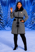 Plaid faux fur collar coat styled in snowy winter outdoor setting with thigh-high boots