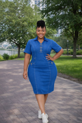 Royal blue denim bodycon dress styled casually with white sneakers